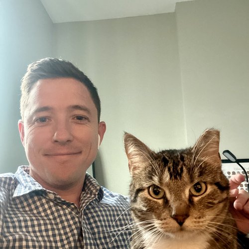 Matthew Self with his cat